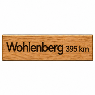 Holzschild „Wohlenberg 395 km“